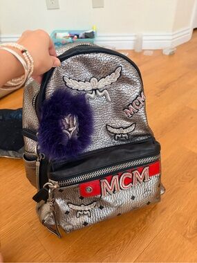 MCM Silver Leather Backpack with Purple Fur Pom